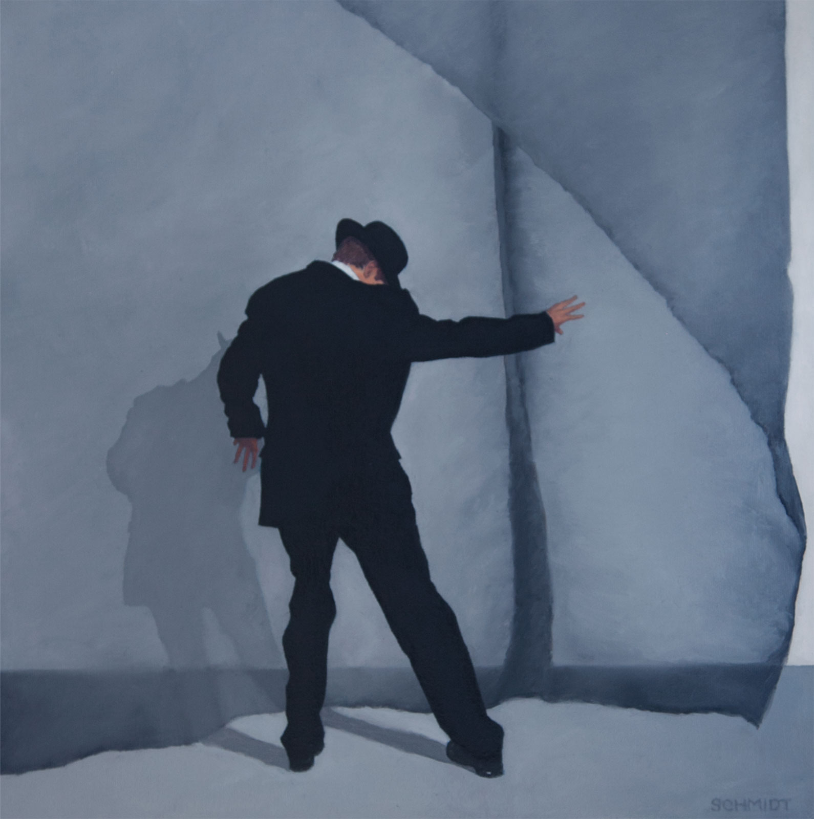 Man dancing wearing fedora hat and suit