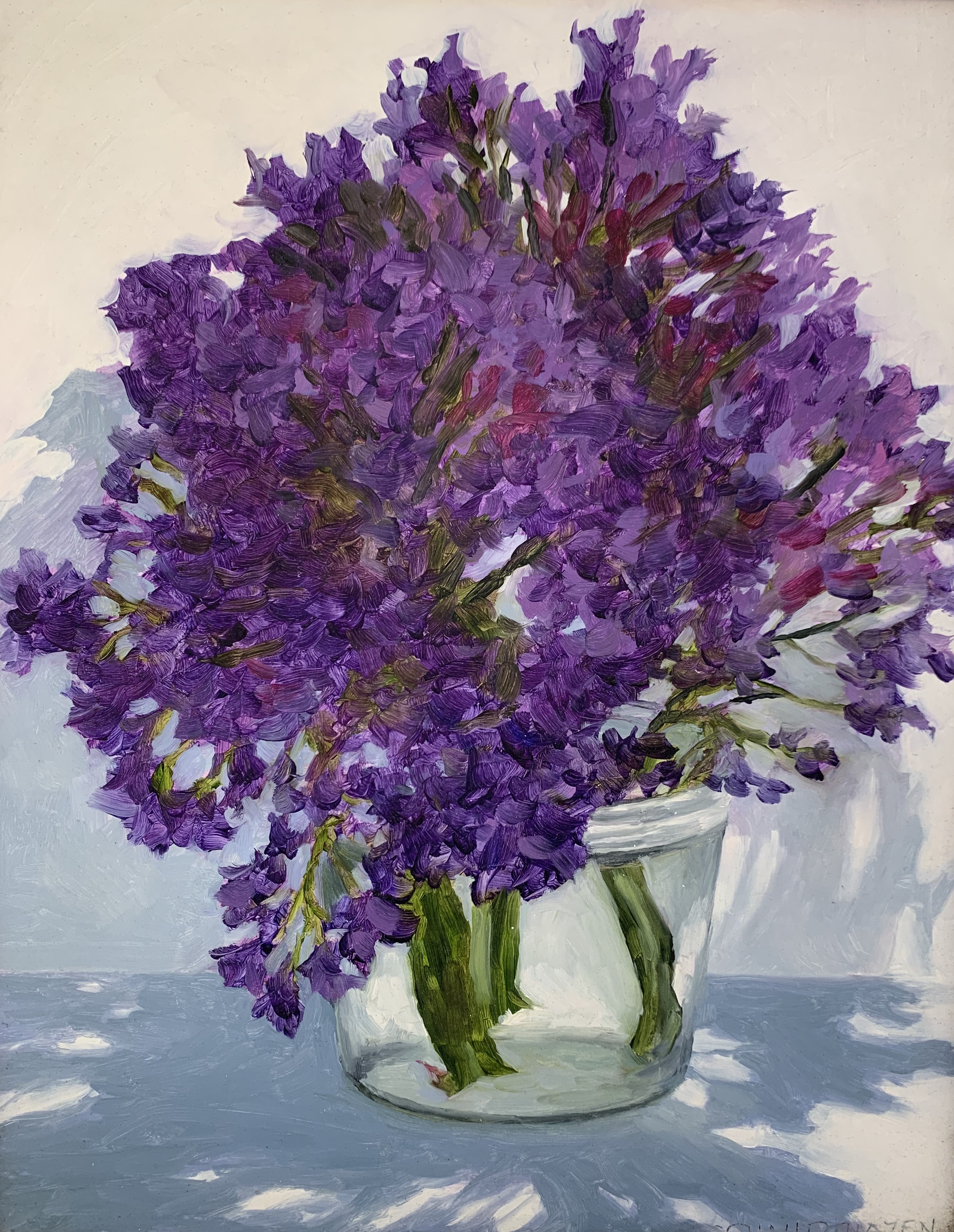 Small purple flowers in jar