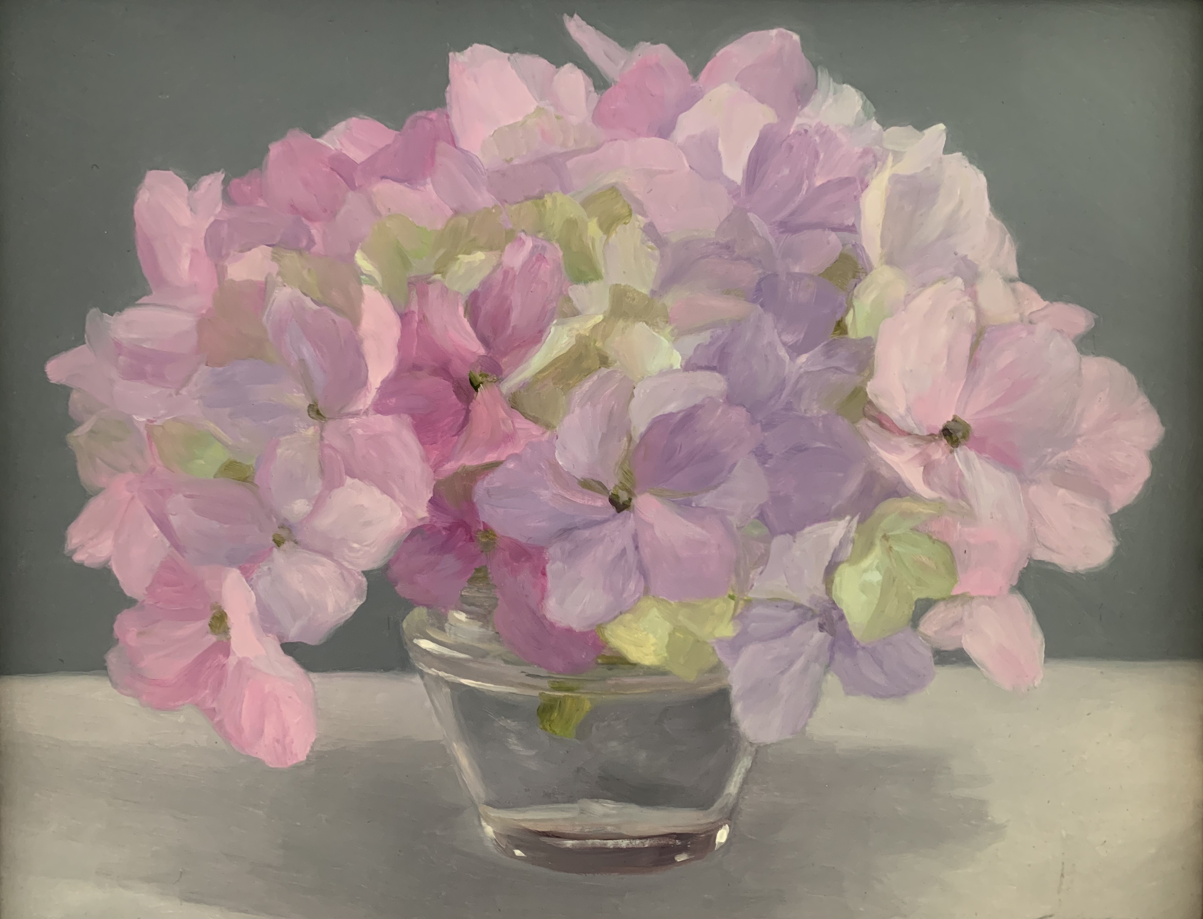 Pink hydrangeas in clear Vichy jar
